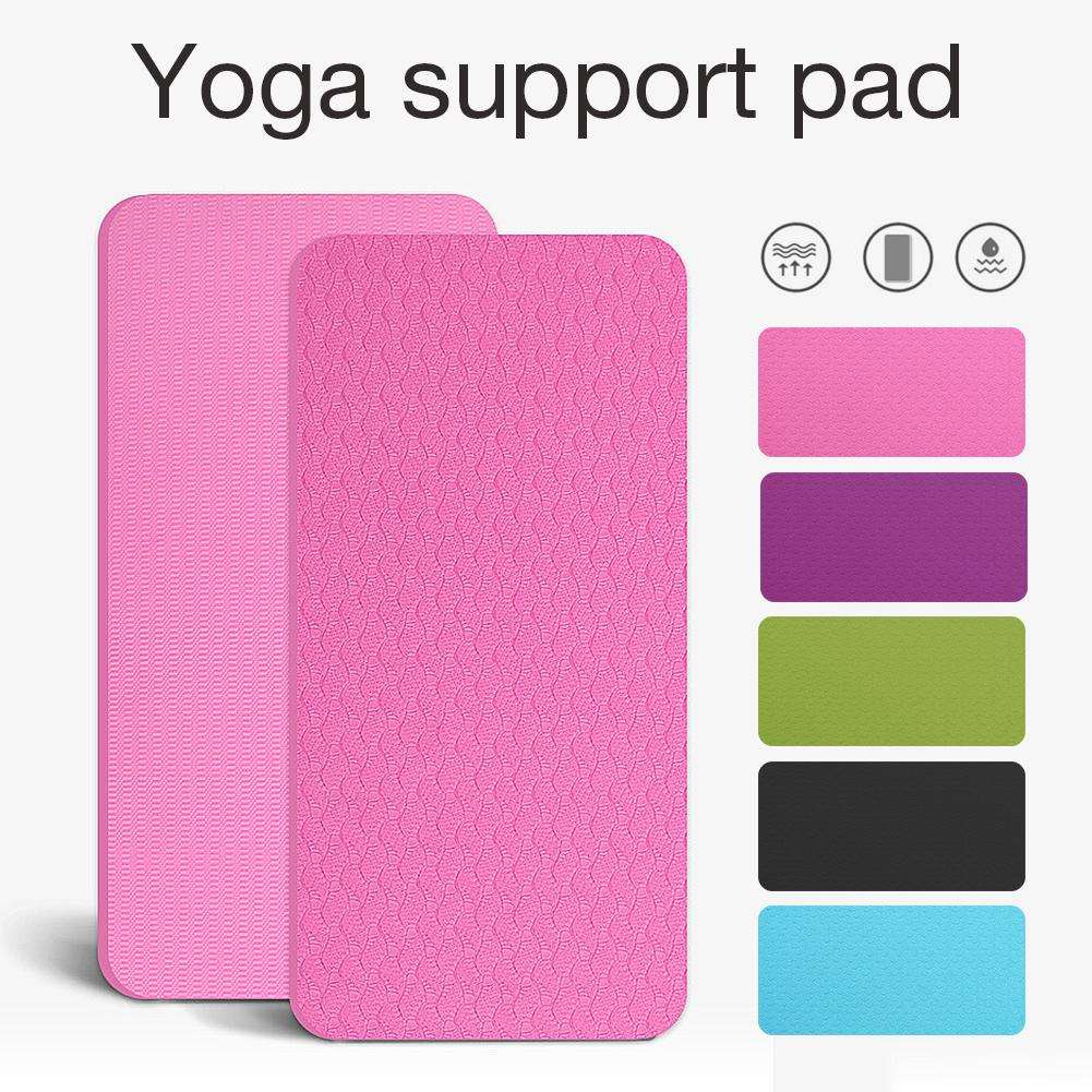 Pink yoga support pad with textured grip, available in multiple colors for home gym workouts