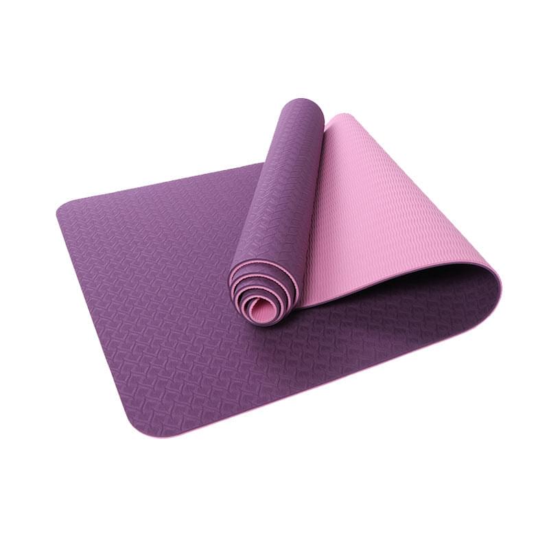 Purple and pink yoga mat with textured grip, ideal for home gym workouts and yoga sessions