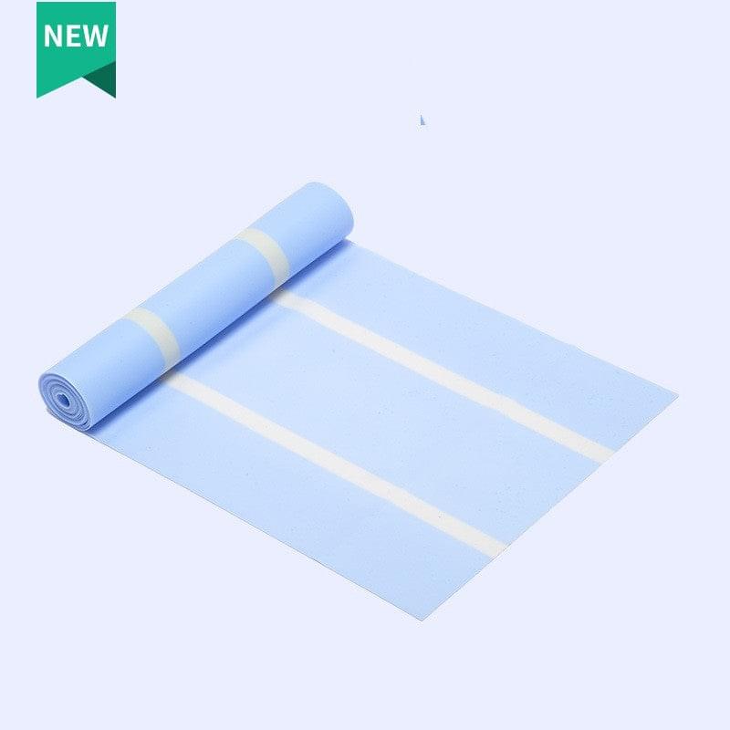 Light blue yoga mat with alignment stripes, partially rolled, ideal for home gym workouts