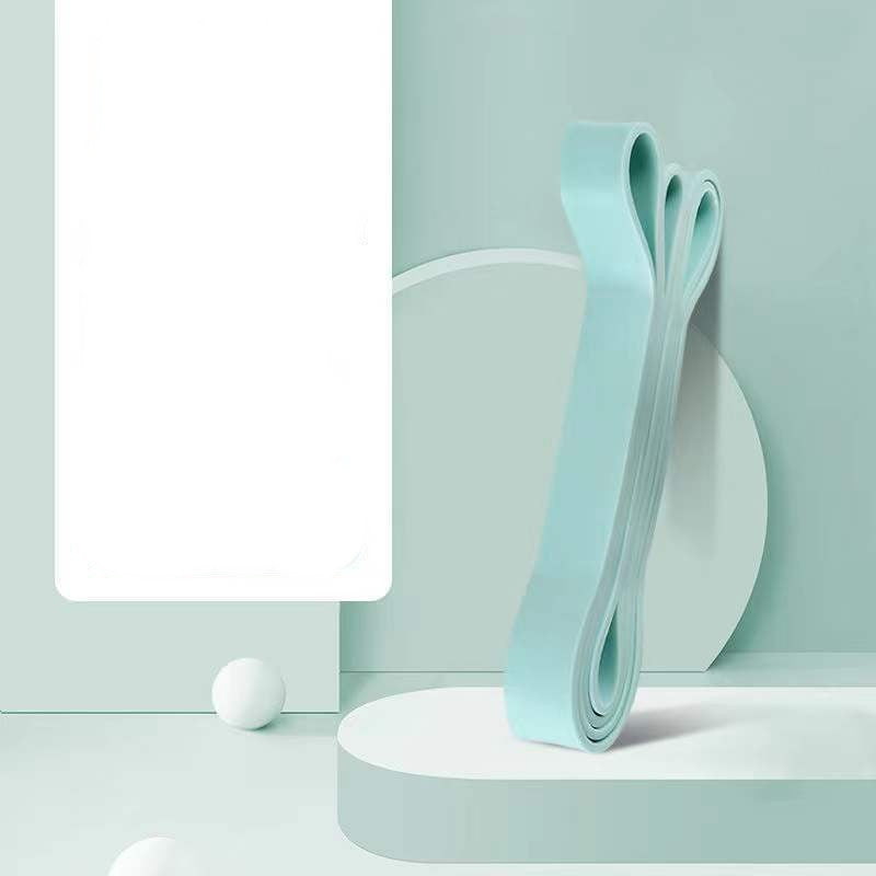 Light blue resistance bands on white pedestal, ideal for home gym workouts and strength training