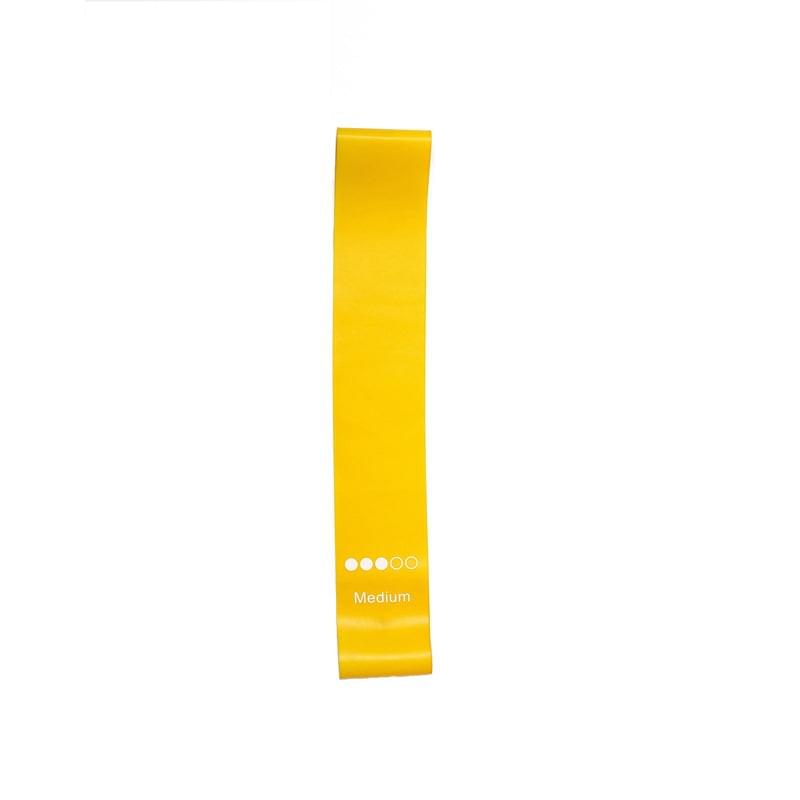 Yellow medium resistance band for home workouts and strength training