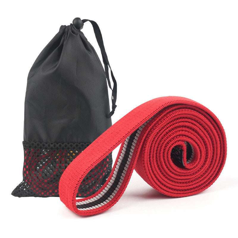 Red resistance band with black mesh carry bag for home gym workouts