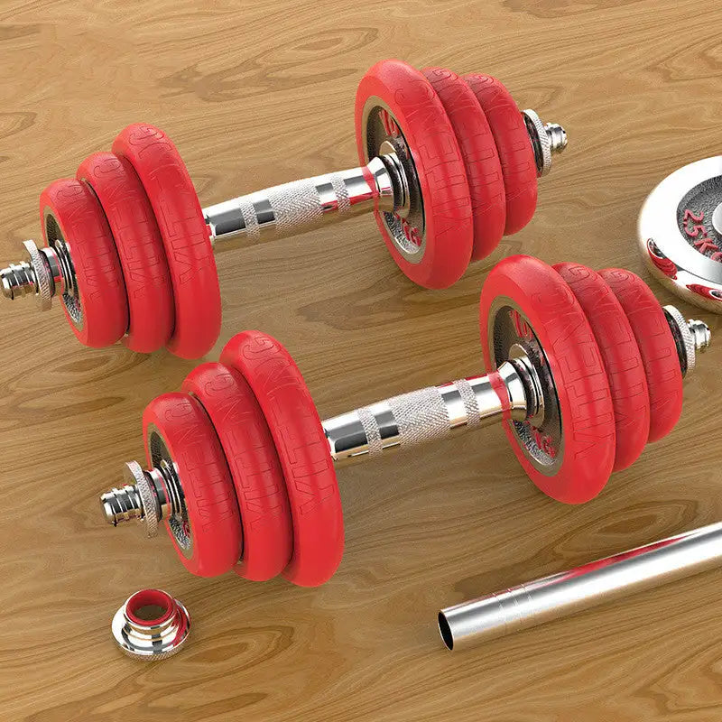 Adjustable red dumbbells with chrome handles on wooden floor, ideal for home gym workouts